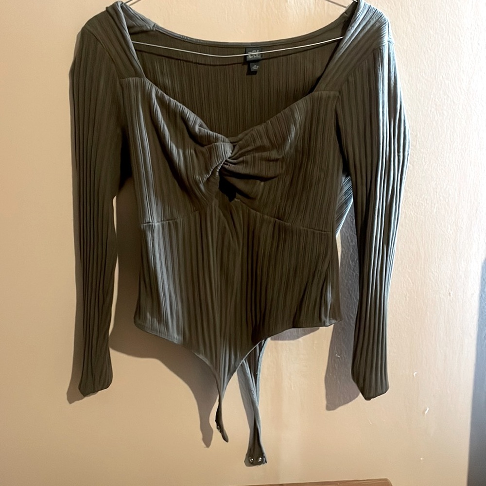 Xl body suit with cuts in front